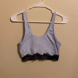 Light blue with navy blue lace sports bra